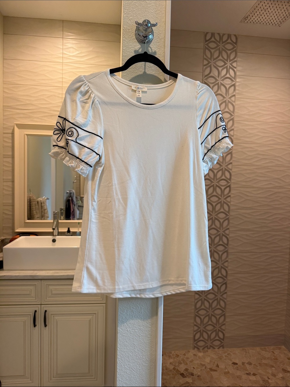 Women’s White Puff Sleeve Tee with Black Embroidered Accents